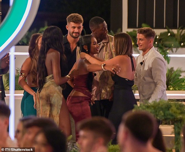 The stunner fell in love with the hunk during this summer's series and while things were seemingly going well between them, they were yet to make things official [pictured with their fellow islanders]