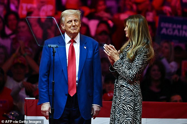 Former US First Lady Melania Trump cheers on her husband, former US President and Republican presidential candidate Donald Trump, after he spoke at a campaign rally at Madison Square Garden