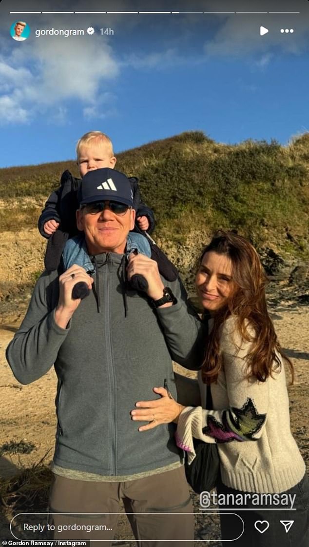 In one of the photos, Gordon grinned as he posed in brown pants and a gray fleece wearing an Adidas cap and sunglasses as he held Jesse, 13 months, and posed with his wife Tana.