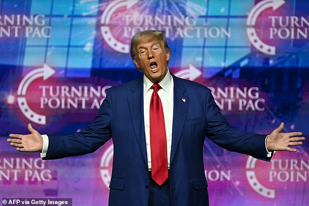 Donald Trump gestures as he arrives to speak at a Turning Point Action 'United for Change' campaign rally in Las Vegas, Nevada on October 24