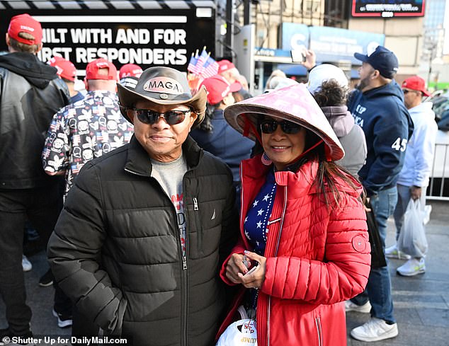 As I stood in line, 62-year-old Amy Lee (above, right) told me that she had fled communist Vietnam in 1975 and that her husband Covan (left) was caught 18 times trying to escape before finally catching the reached the United States.