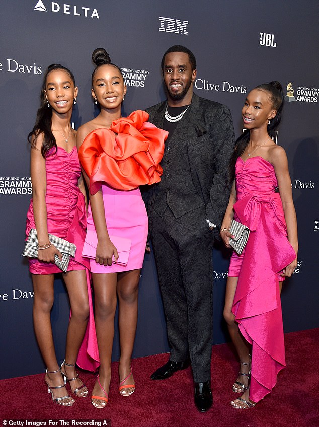 Diddy's daughters are reportedly being cared for by a close friend of his late partner Kim Porter - while he remains in jail awaiting trial in a federal sex trafficking case; Diddy pictured with his daughters D'Lila, Chance and Jesse in 2020