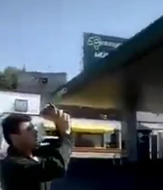 A Mexican resident was one of many who stopped at a gas station to document the alleged sighting of a UFO