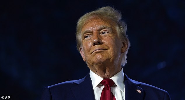 Republican presidential candidate, former President Donald Trump, listens during the National Faith Summit at Worship With Wonders Church in Powder Springs on Monday