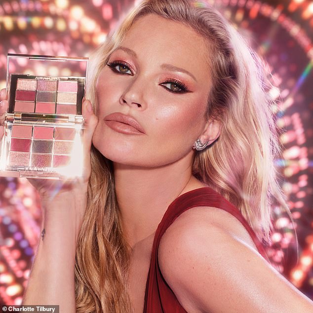 Kate Moss has long been one of the faces of Charlotte Tilbury and looked sensational as she posed with one of the makeup mogul's eyeshadow palettes