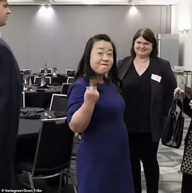 Tribe shared a bizarre image of ACT Liberal leader Elizabeth Lee raising her middle finger at reporters