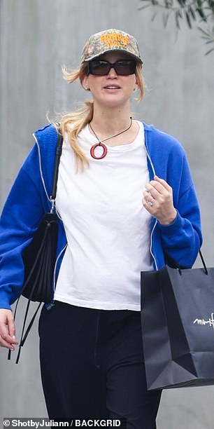 She added a royal blue zip-up hoodie