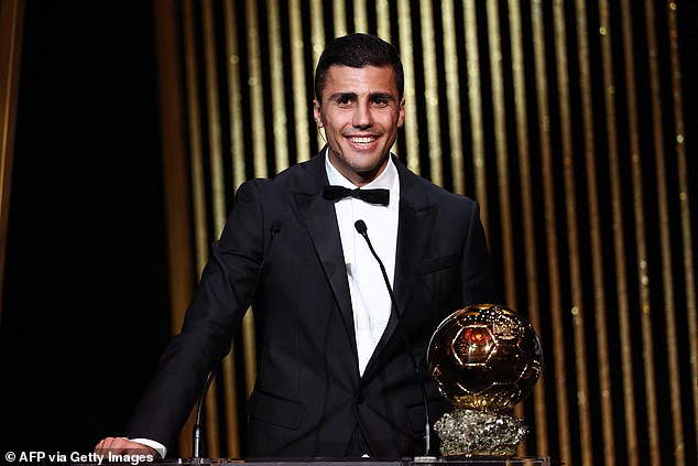 Manchester City's Spanish midfielder Rodri receives the Ballon d'Or award during the 2024 Ballon d'Or France Football awards ceremony at the Theater du Chatelet in Paris on October 28