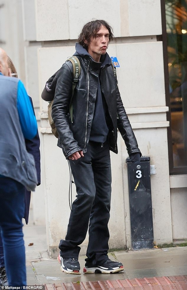 The singer looked worlds away from his wild rock 'n' roll days as he left the BBC Broadcasting House studios in London on Tuesday