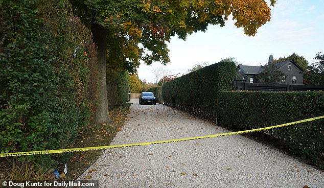 Police are seen outside the hotel on Tuesday