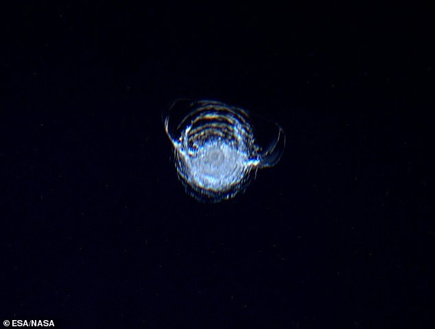 ESA astronaut Tim Peake took this photo from inside Cupola in 2016, showing a circular chip with a diameter of 7 mm ripped out by the impact of a small piece of space debris