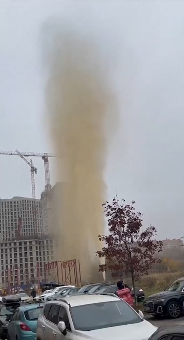 Sickening footage showed a tower of murky water pouring from a pipe next to what appears to be a construction site in the Novaya Moskva district