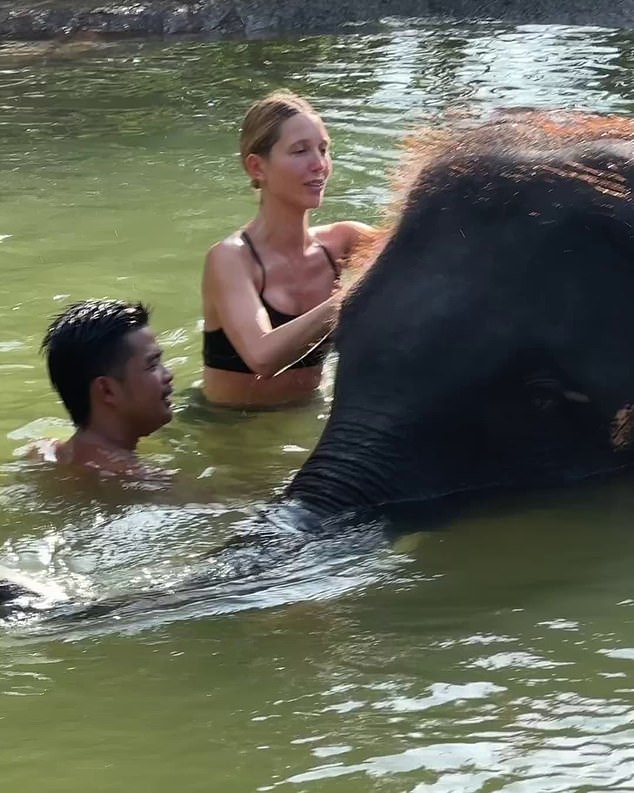 During a trip to Thailand, the London-based socialite and model shared a video of herself bathing an elephant in the river at Bangkok's Pattaya Elephant Sanctuary