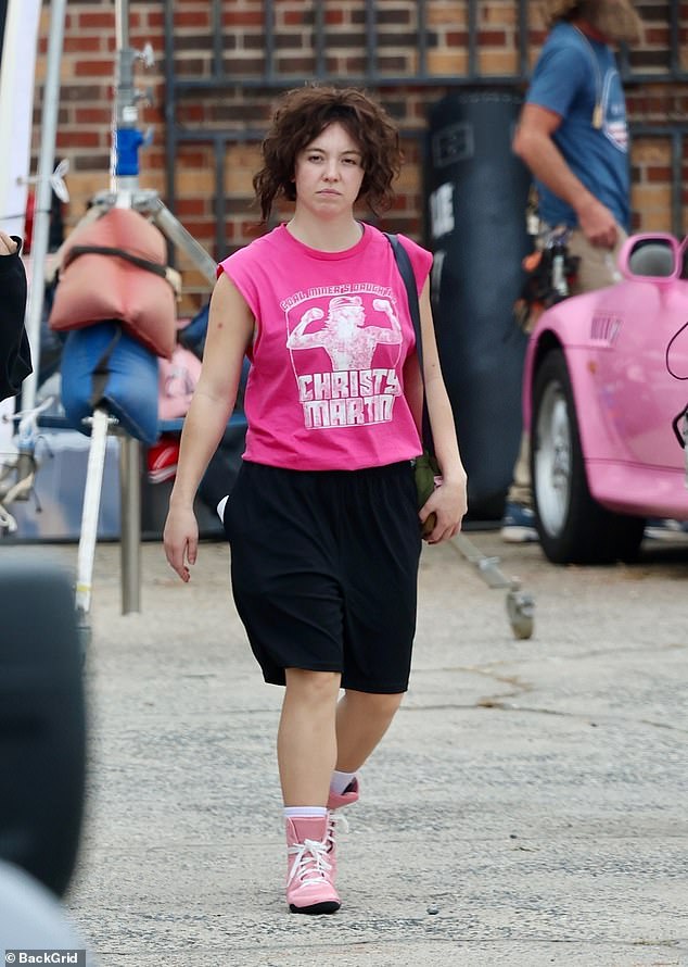 Swapping her usual red carpet style for a loose sports ensemble, Sweeney wore a brunette wig, pink tank top and dark shorts, capturing Martin's spirit from her early boxing days.