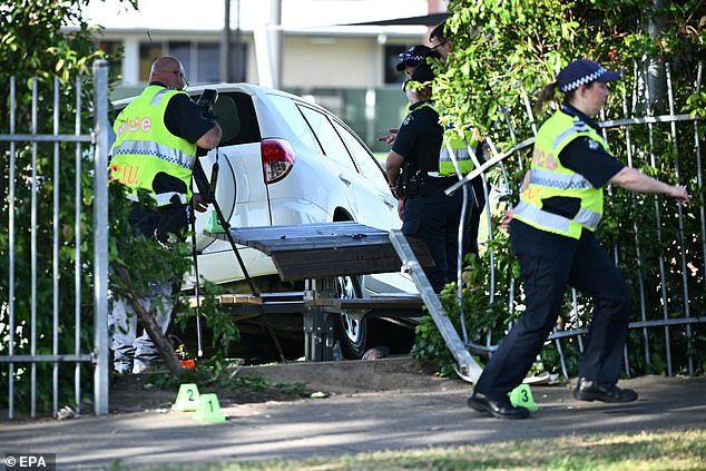 A 40-year-old woman had just picked up her child from school and was making a U-turn when it became clear she had suffered a medical episode before plowing through the fence