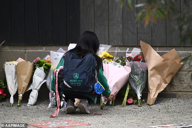 A classmate left some flowers at school after Tuesday's tragedy