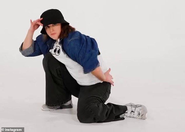 Raygun produces some of her signature dance moves in a stark white room in the heavily edited clip (pictured)