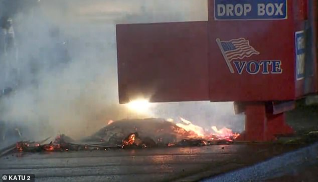 The fire burned at the polls in Vancouver, WA early Monday morning. Police say the fire was started by a device placed outside the ballot box that contained hundreds of ballots at the time