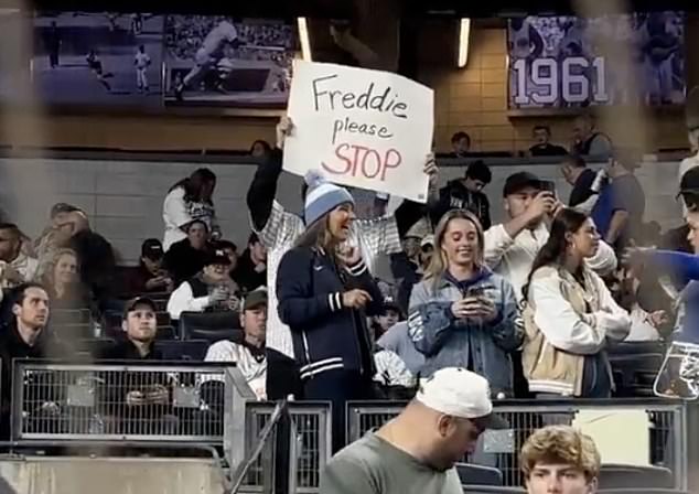 A Yankees fan begs Dodgers star Freddie Freeman not to inflict more pain