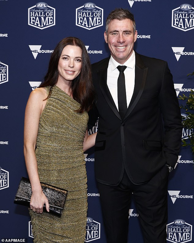 'Richo' (pictured with his wife Genevieve Holiday at this year's Australian Football Hall of Fame ceremony) saw the lighter side of his embarrassing misstep