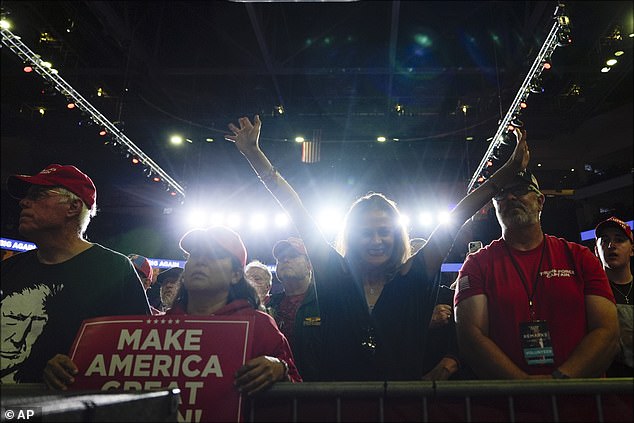 Supporters listen as former Republican presidential candidate Donald Trump speaks during a campaign rally at the PPL Center, Tuesday, Oct. 29, 2024, in Allentown, Pennsylvania