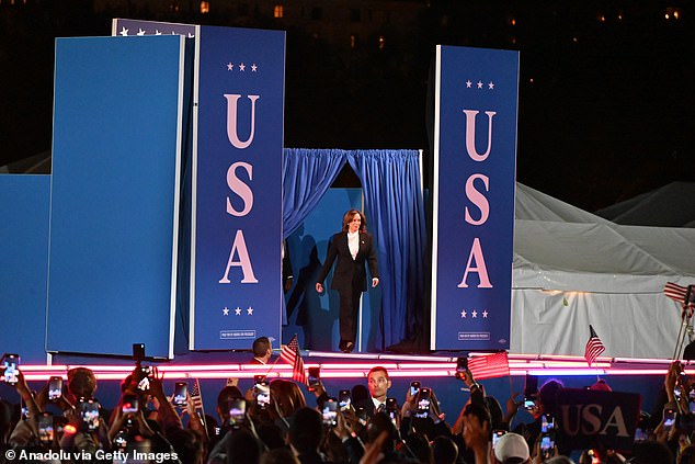 Harris makes her entrance on stage in front of thousands of people as helicopters buzzed overhead