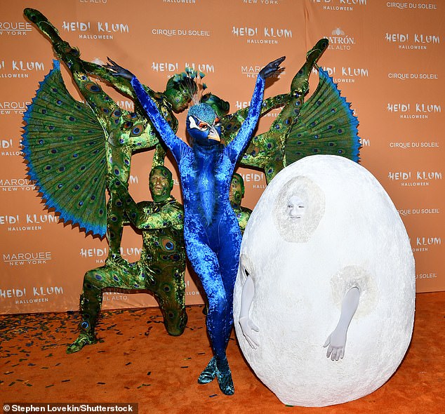 The married couple from five years earlier previously dressed up together as Peacock and Egg (pictured in 2023), Worm and Fisherman, Shrek and Fiona, as well as Alien and Astronaut