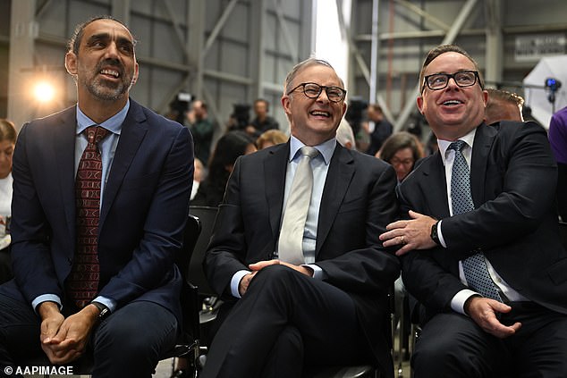 Former AFL star Adam Goodes, Mr Albanese and Mr Joyce at a Qantas event in 2023