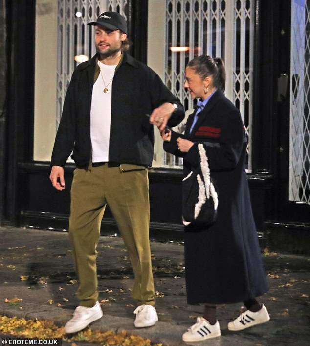 The Benidorm star turned Hollywood sensation, 32, looked smitten as she held hands with her fellow actor husband, also 32, as they left BRAT in Shoreditch on Tuesday