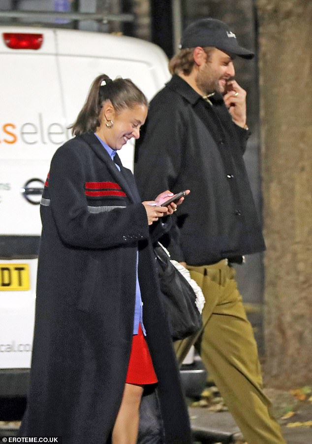 Keeping it casual, she topped off her anniversary with a pair of Adidas sneakers and a sleek ponytail