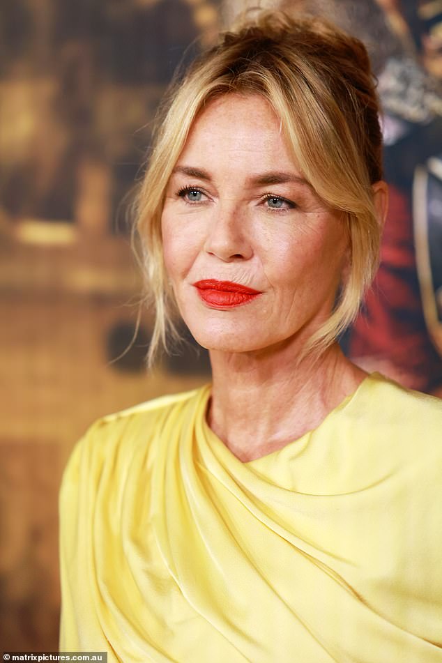 The Danish actress looks stunning in a yellow Stella McCartney dress worth a whopping $4,440