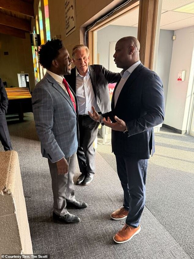 Sen. Tim Scott spoke to voters in the swing state of Michigan on Tuesday, where he attended events with Mike Rogers (center), who is running for Senate in the state. He has traveled around the county speaking to black voters ahead of the election