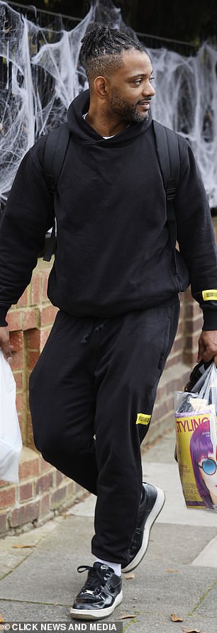 JB looked prepared for a grueling day of training in an all-black tracksuit and trainers