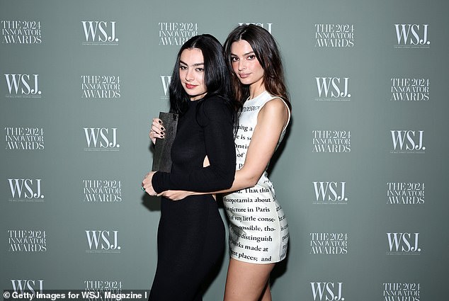 Emily was later seen joining Charli XCX on the red carpet as they stopped to take a few memorable snaps together