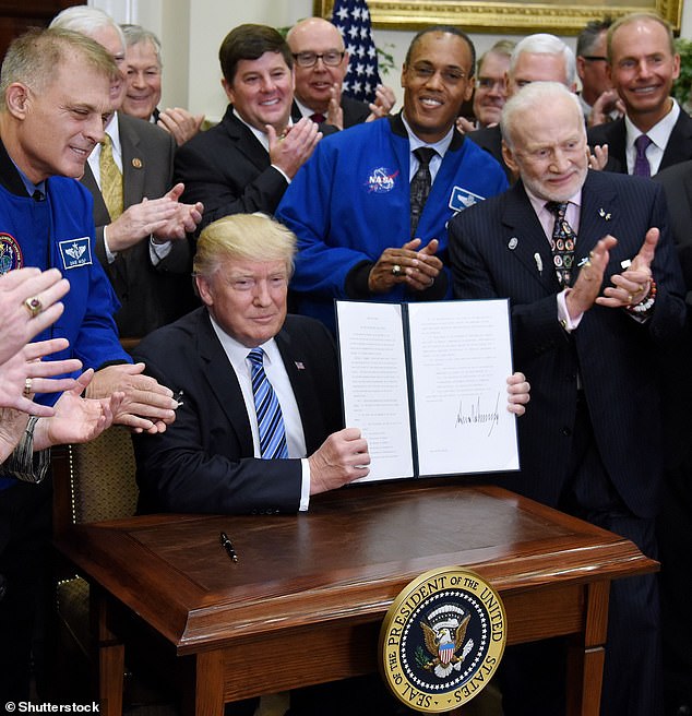 Aldrin was present in the Oval Office, at the former president's side, when the National Space Council was reinstated after it was disbanded in 1993.