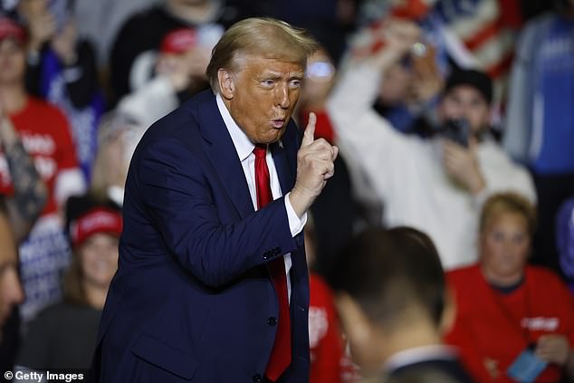 Republican presidential candidate, former President Donald Trump gestures during a campaign rally at the PPL Center on October 29, 2024 in Allentown, Pennsylvania