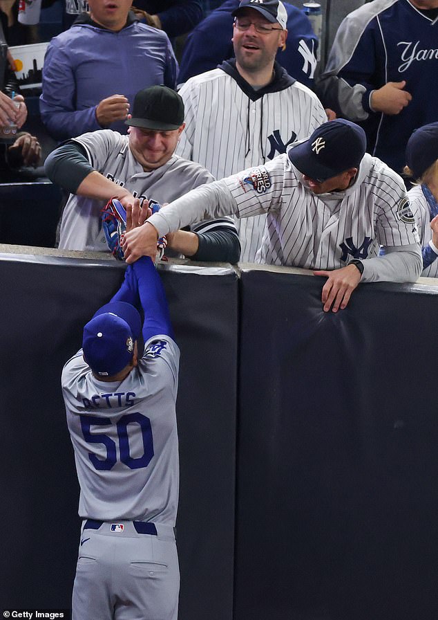 Capobianco (left), a season ticket holder from Connecticut, was ejected for his antics