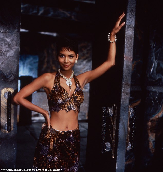 The Flintstones (1994) starred Halle (pictured) as Sharon Stone, a glamorous character who quickly stood out with her striking animal print dress and memorable one-liners.