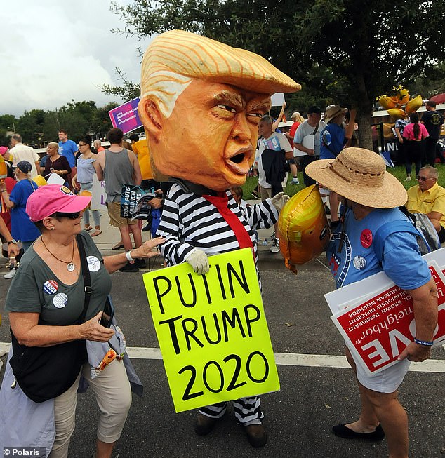 More than a decade later, Hillary Clinton labeled Trump “an illegitimate president” in 2016 as Democrats fueled the lie that Trump colluded with Russia to rig the election. (Above) Protesters outside the Trump campaign rally on June 18, 2019 in Orlando, Florida