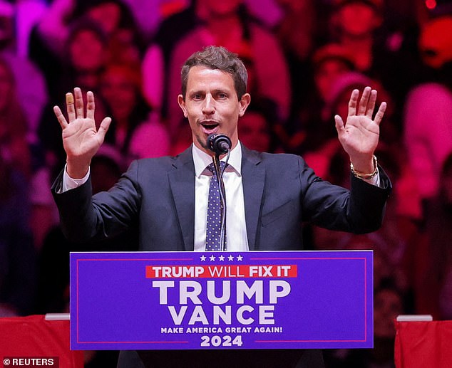 Tony Hinchcliffe is pictured at the Trump rally on Sunday where he delivered the joke