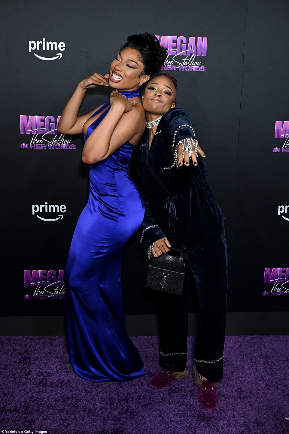 On the red carpet, she took a moment to pose with Nneka Onuorah, the director of the documentary, who dazzled in a chic pantsuit adorned with a stunning array of diamond jewelry.