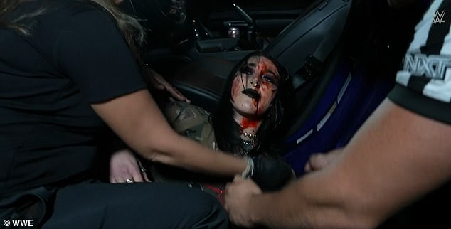 The popular wrestler was attacked by 'heel' Liv Morgan and her 'enforcer' Raquel Rodriguez in the parking lot during the most recent broadcast of the WWE show NXT