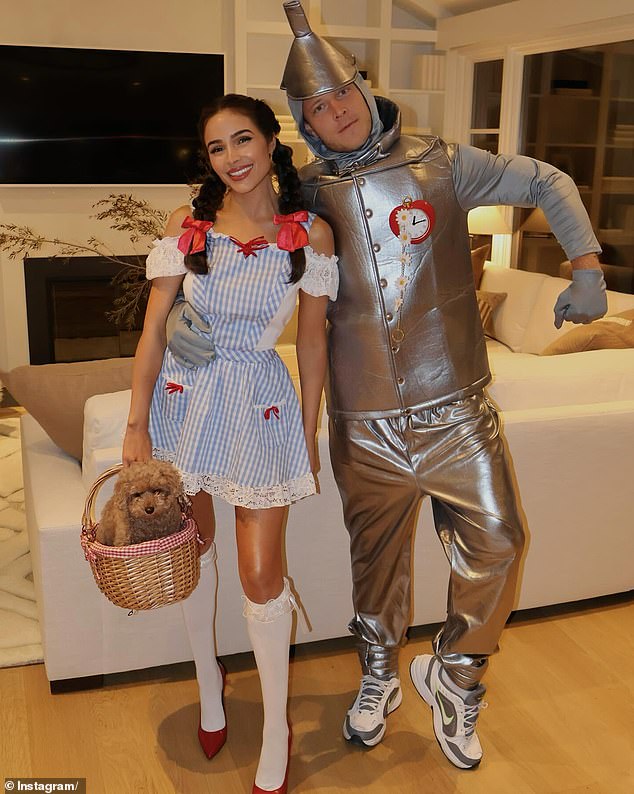 For the occasion, the model, 32, and her NFL star husband Christian McCaffret, dressed as Dorothy and Hickory, a farmhand also known as the Tin Man, from The Wizard Of Oz