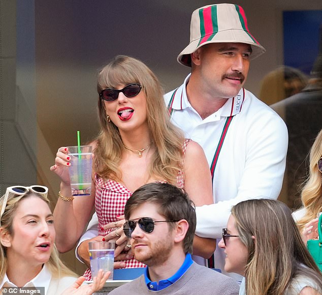 Swift wore a red and white gingham dress by Reformation and Kelce in a matching white Gucci set, complete with a patterned bucket hat