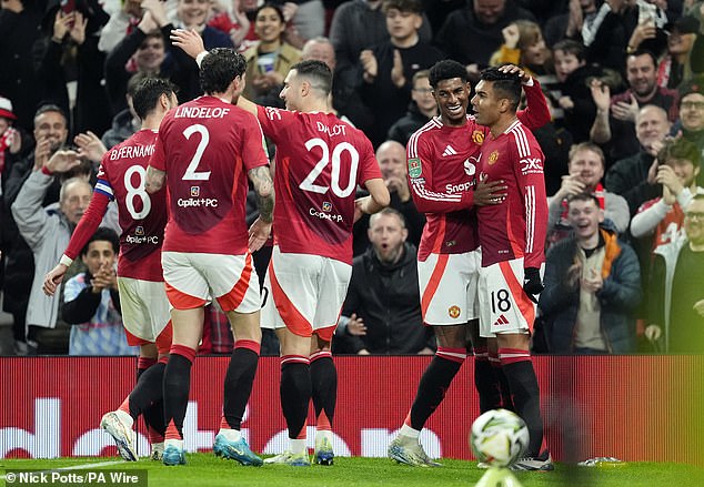 The interim manager admitted he was 'delighted' for Casemiro (right) after scoring twice