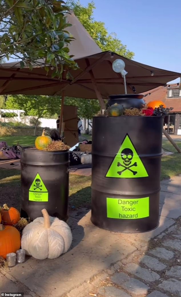 This person's decorations certainly had the X-factor as they completed their incredible decor with toxic waste barrels in the garden