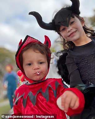 One of their children was decked out in an IT costume, while two others were dressed as Maleficent and a little devil. Pictured