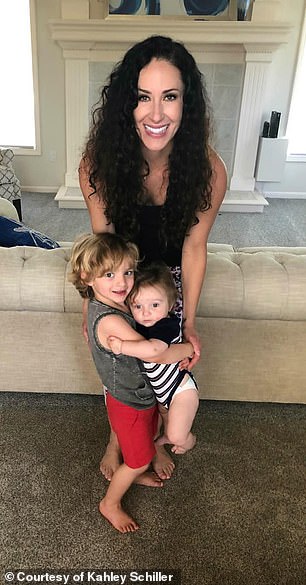 The active mother of two (pictured here with her two sons before diagnosis) was forced to get her will in order while she waited out a liver condition.