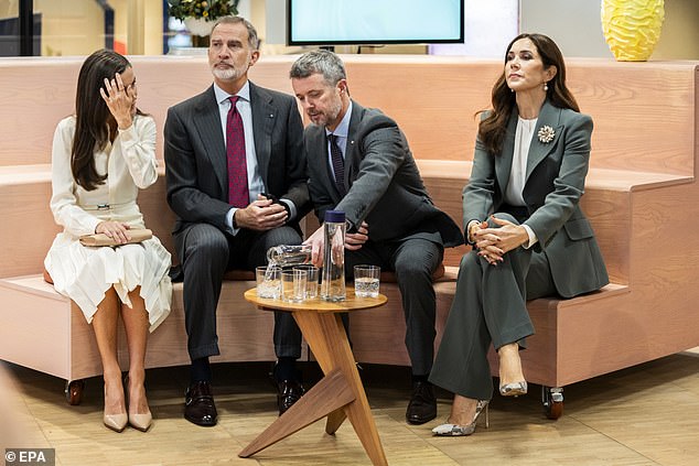 The couple appeared to shut each other out during their first public appearance after the photos were published in Madrid