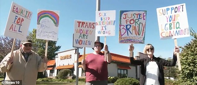 Protesters can be seen here outside the restaurant in support of Livingston and her claims